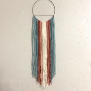 A multi-colored dream catcher.